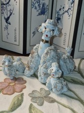 Vintage mid-century light blue SPAGHETTI ceramic poodle figurines. Mother and 2 picture