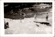 Woman Making Mega Snowball Snapshot Americana Funny Winter 1940s Vintage Photo picture