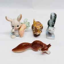 Vtg Four (4) Animal Figurines Two Bunnies Squirrel Skunk Size: See Description picture