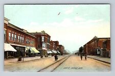 Owosso MI-Michigan Main St, Storefronts, Antique, Souvenir Vintage Postcard picture