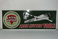 Vintage 1980’s Keen Kutter TOOLS Metal Embossed Sign With Axe And Hand Saw picture