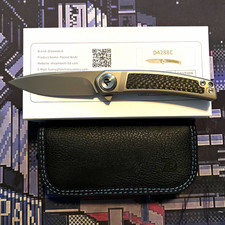 Dreamtech D4288C with M390 steel & Titanium/Carbon Fiber handles. picture