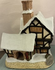 Mister Fezziwig's Emporium Christmas cottage 1990 by “David Winter” Collection  picture