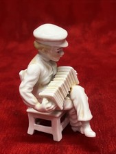 VINTAGE FIGURINE PLAYING ACCORDION SITTING CHAIR - MADE IN JAPAN picture