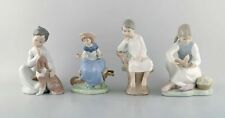 Lladro and Nao, Spain. Four porcelain figurines of children. 1980 / 90's picture