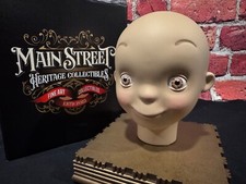 Disney It's a Small World Animatronic Doll Head prop hand signed by Bob Gurr picture