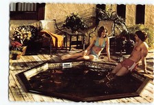 Postcard Couple in an Octagonal Redwood Hot Tub picture