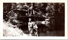 Two Boys Swimming by River Cabin, 1930s B&W Snapshot Photo picture