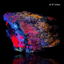 833 GM Afghanite, Lazurite, Sodalite, Calcite, Phlogopite, Fluorapatite, Pyrite picture