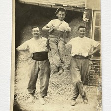 Antique RPPC Photograph Postcard Handsome Men Wine Performers Odd Acrobat picture