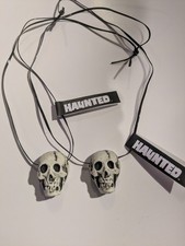 Haunted glow skull necklace x 2 randotti copy creepy picture