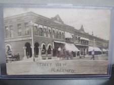 RPPC Real Photo Postcard Blackwell ,Oklahoma Street view Bank  Horses Wagons picture
