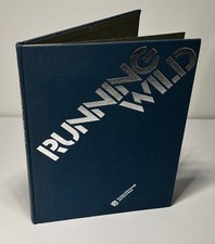 Running Wild: A Pictorial Tribute to the NFL's Greatest Runners - Vintage (1984) picture
