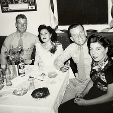 Vintage B&W Snapshot Photograph Beautiful Young Couple Military Men Restaurant picture