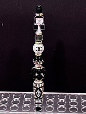 Rare Fashion designer Logo focal fancy beaded pen picture