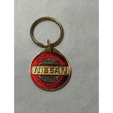 Vintage Nissan Gold Tone Red Glitter Enamel Round Keychain Car Enthusiast JDM picture