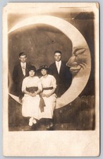 RPPC Postcard Two Unhappy Couples Seated On Left Facing TALL Paper Moon picture