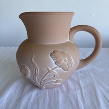 Terra Cotta Unglazed Pitcher With Flower Detail 7” picture