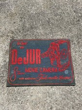 VINTAGE DEJUR MOVIE CAMERAS DEALERS COUNTER TOP MAT ANTIQUE RARE picture
