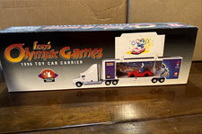 Texaco Izzy's Olympic Games 1996 Havoline Diecast Car Carrier Toy Truck picture