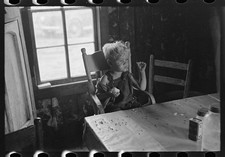 Photo:Southeast Missouri Farms Sharecropper Child Porch Cabin 1938 picture